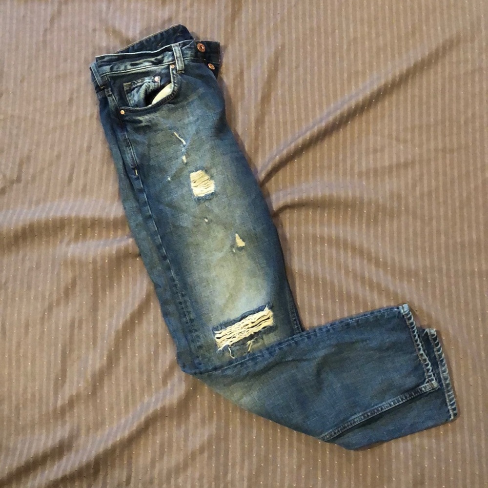 H&M’s Dark Blue Ripped Jeans